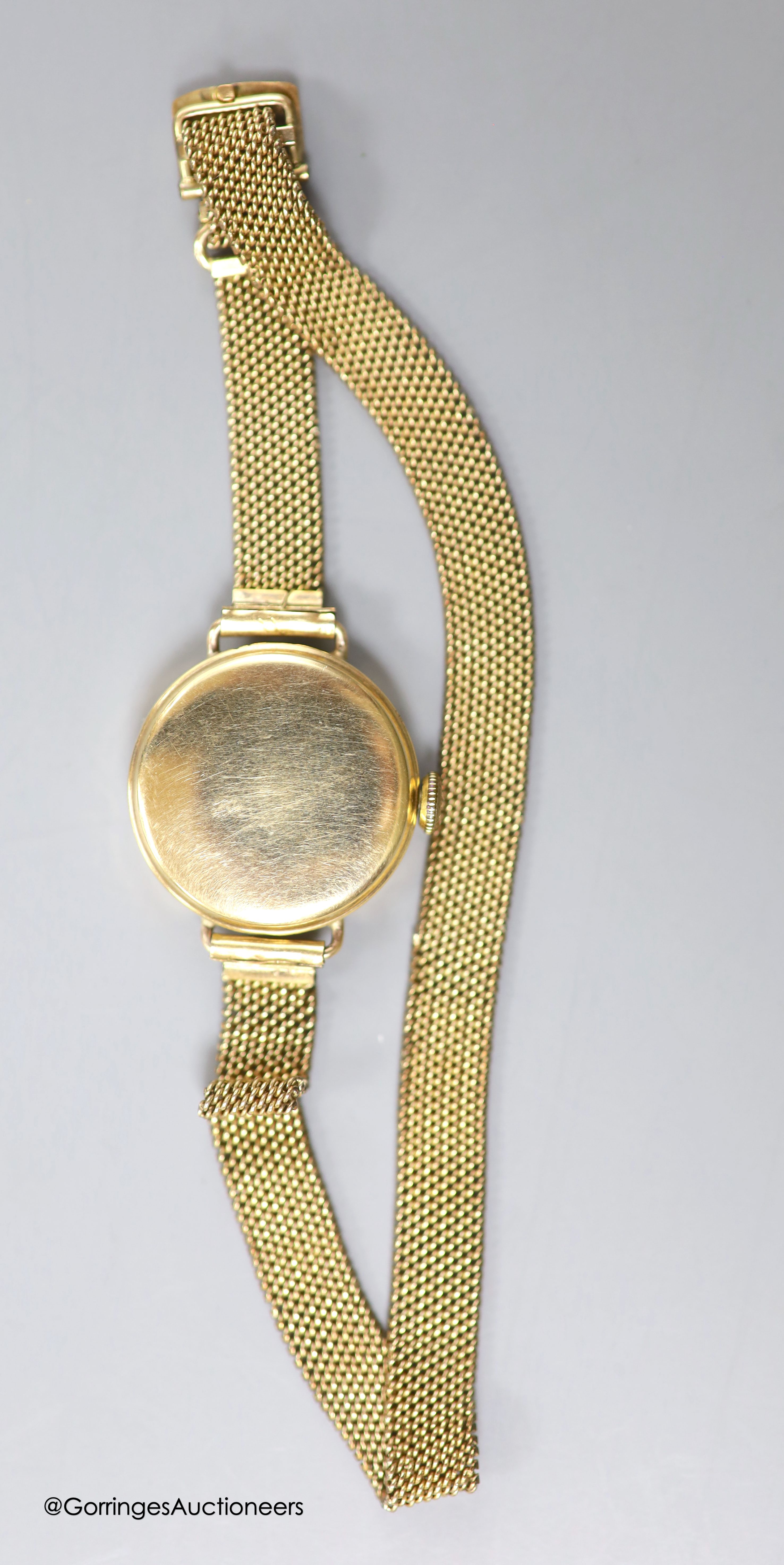 A lady's 9ct gold Vertex manual wind wrist watch, on a rolled gold mesh link bracelet and a similar 9ct gold watch on gold plated flexible bracelet, gross 33 grams.